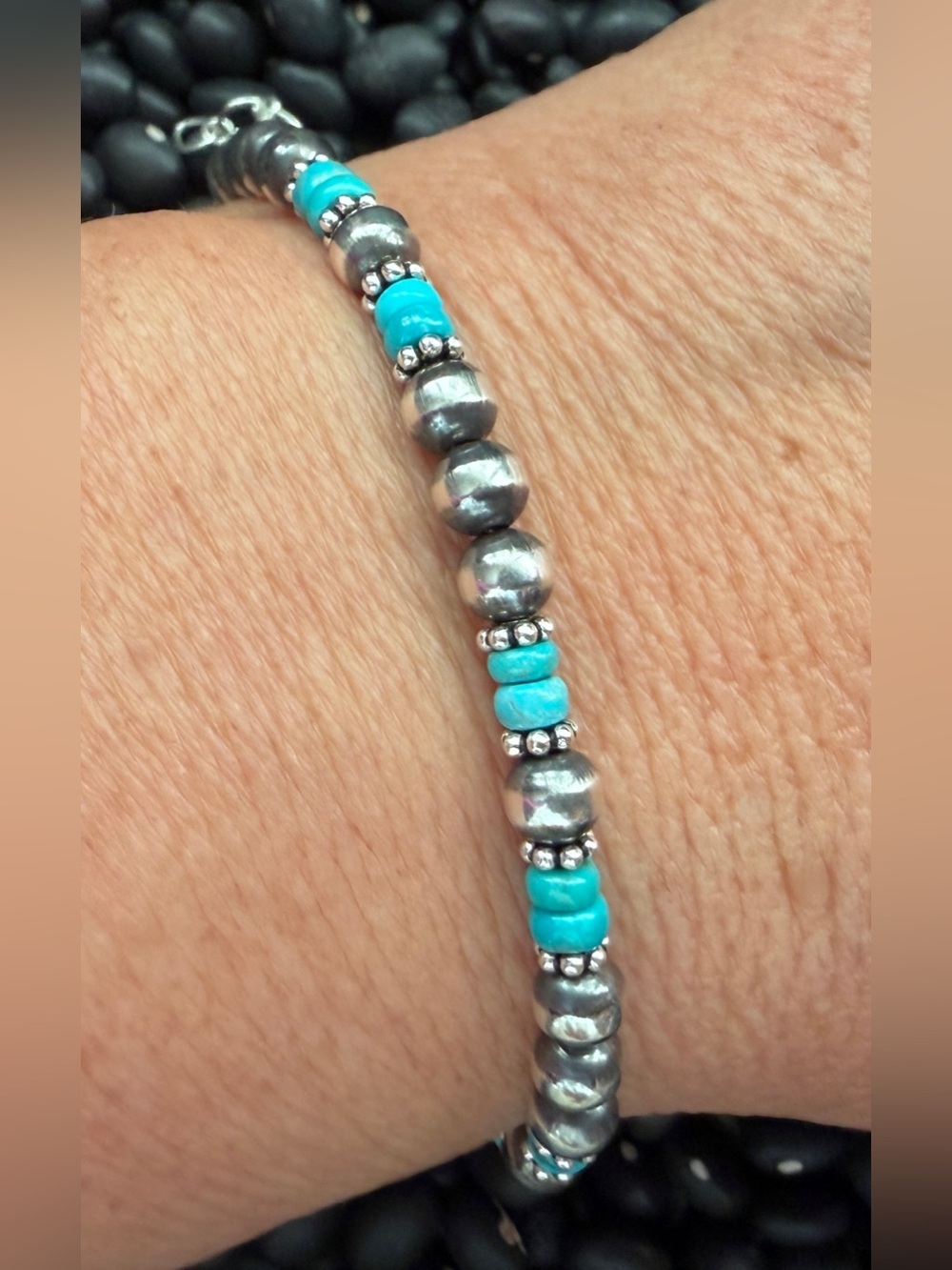 Sterling Silver and Turquoise Bead Bracelet with clasp closure.